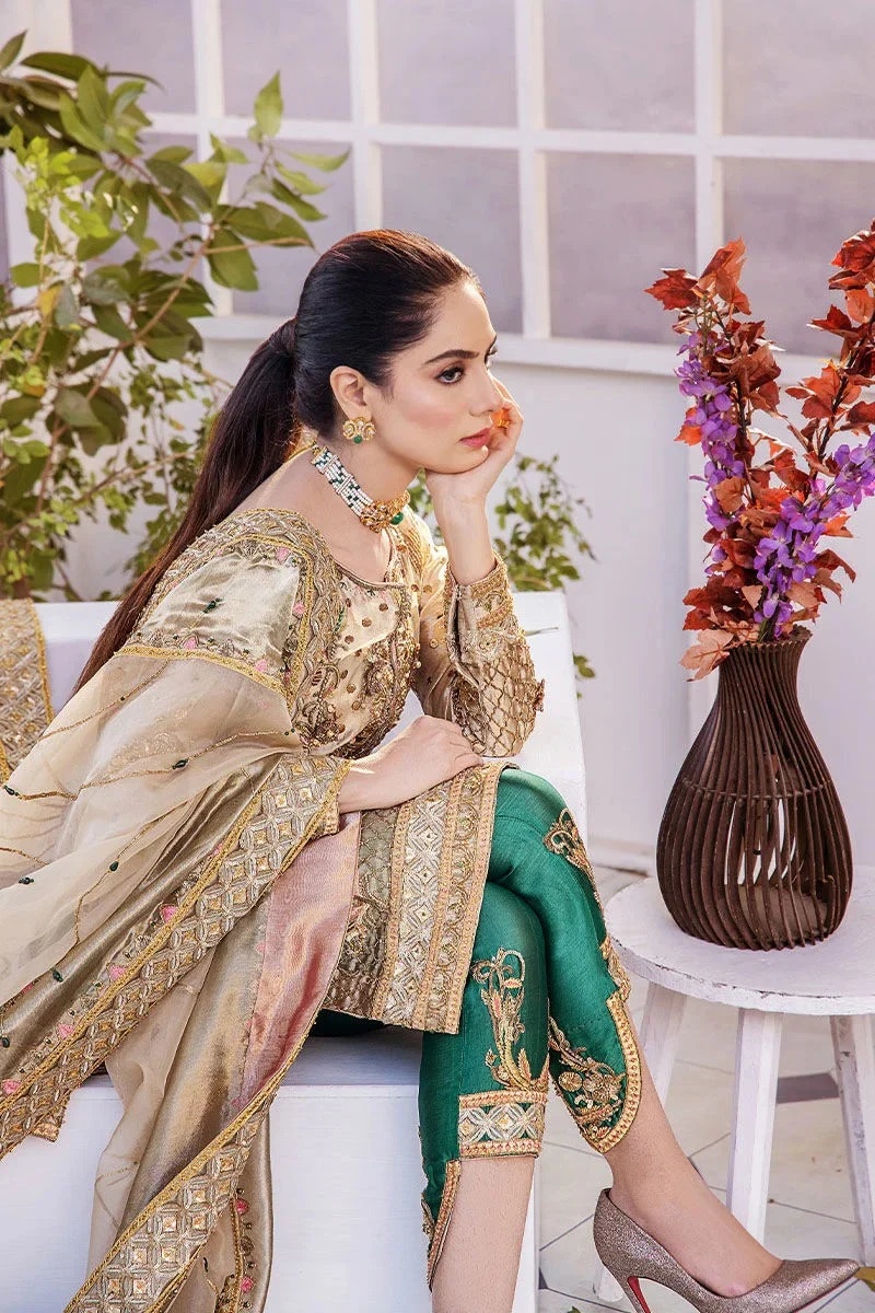 Noor- e- Samar pakistani fashion outfit in gold, green tones.